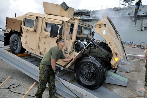 man washing truck